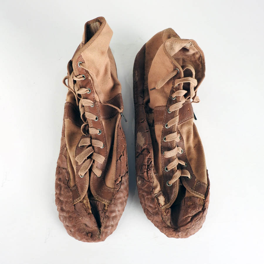 While not a photo of Stroud’s actual running shoes, historical records indicate he may have worn shoes like these when he competed. <span class="cc-gallery-credit"></span>